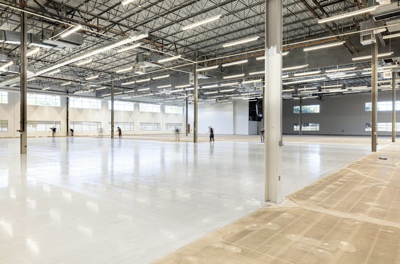 Modern warehouse interior with a polished concrete floor